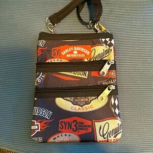 New Harley Davidson shoulder or jean loop purse. No tags but never worn.